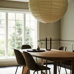 Beeswax U Candle in Black on table