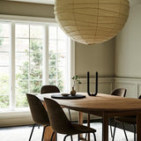 Beeswax U Candle in Black on table