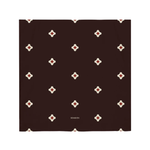 Brown square with white and red geometric pattern on a white background