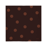 Brown fabric square with lighter brown polka dots on a white background
