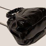 Bombon Handbag - Crinkled Glossy Black laying down