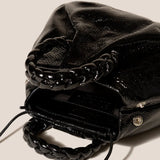 Bombon Handbag - Crinkled Glossy Black laying down