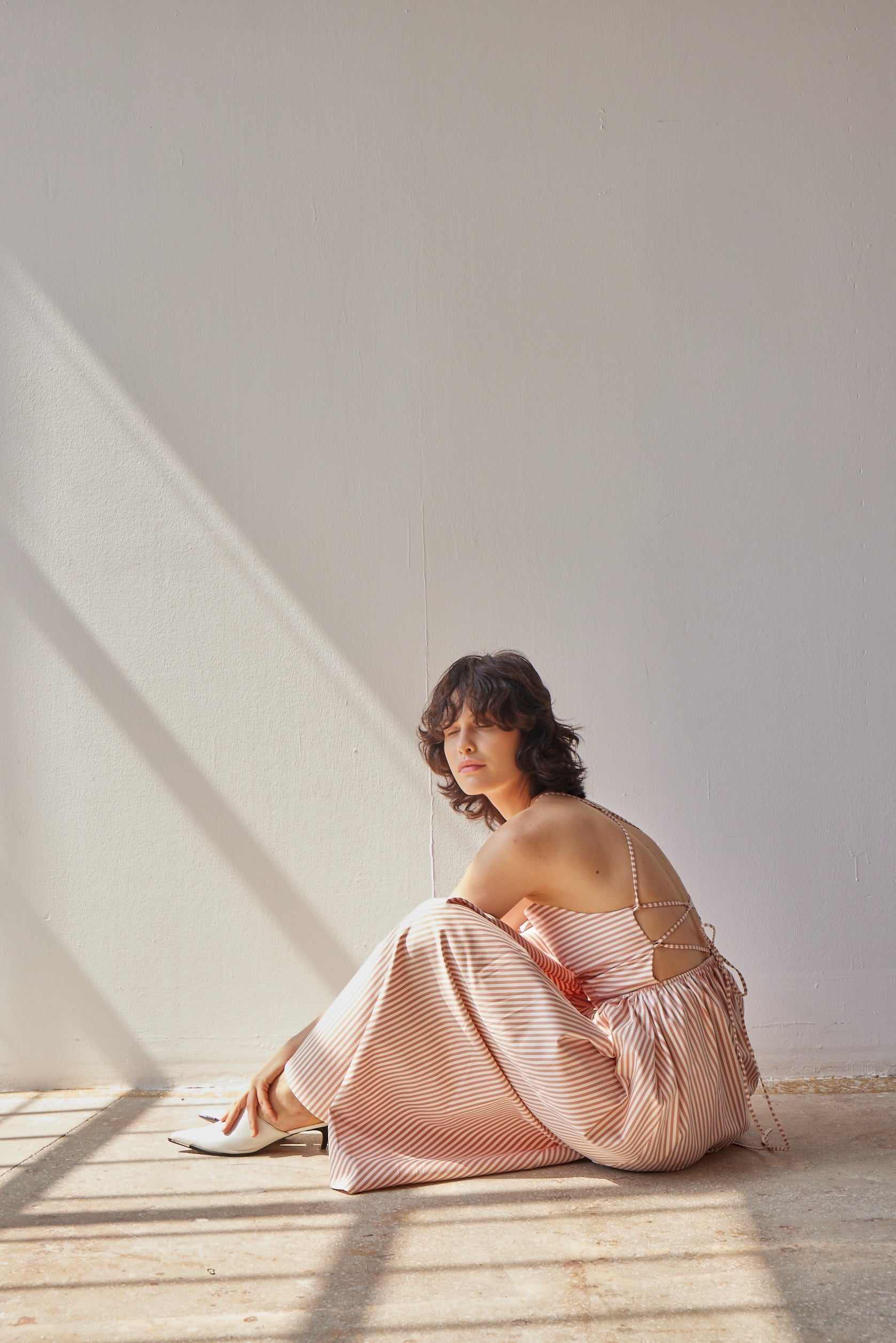 Beth Dress - Pink Stripes on model sitting down