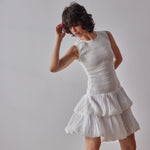 Emilia Dress - White model moving in dress