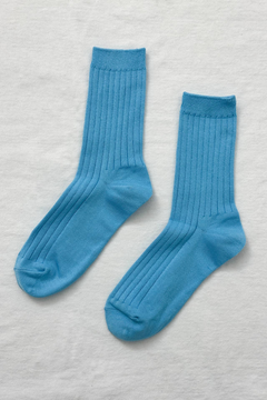 Her Socks in Blue Water