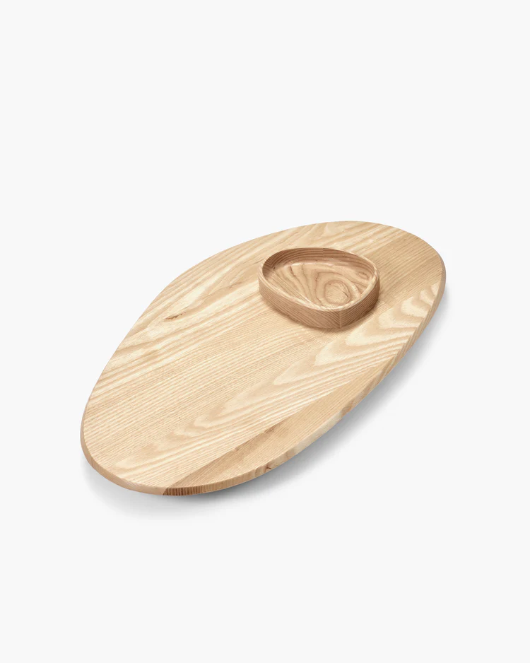 Wooden serving board with a central circular compartment on a white background