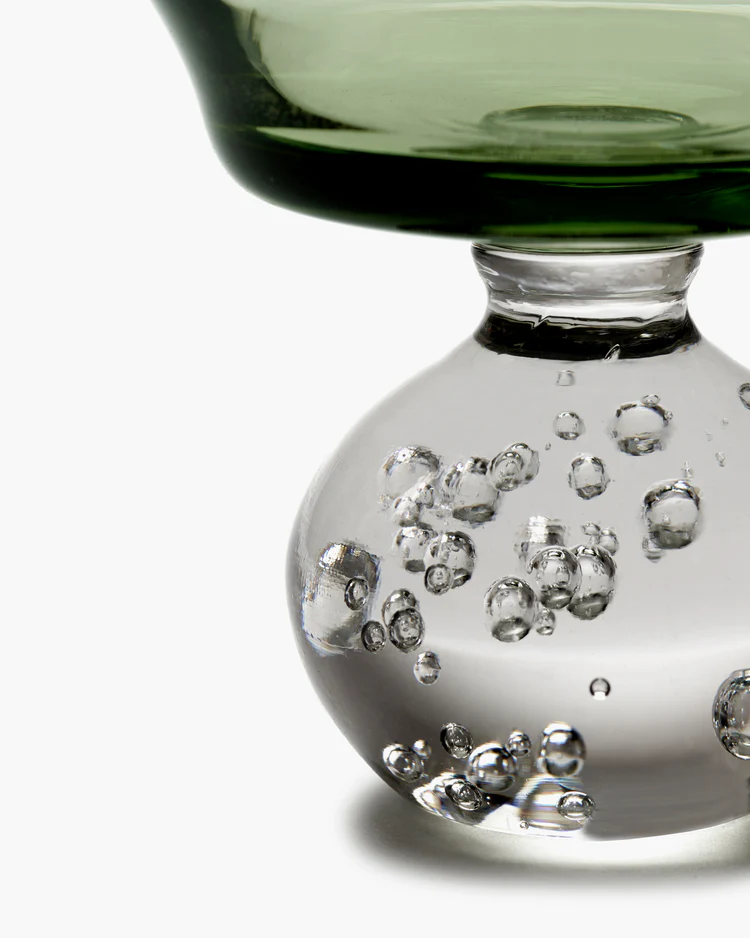 Clear glass vase with bubble design on a white background