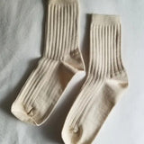 Her Socks in Porcelain