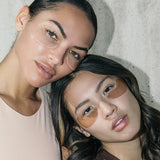 Plumping Eye Masks on model with red wine eye mask