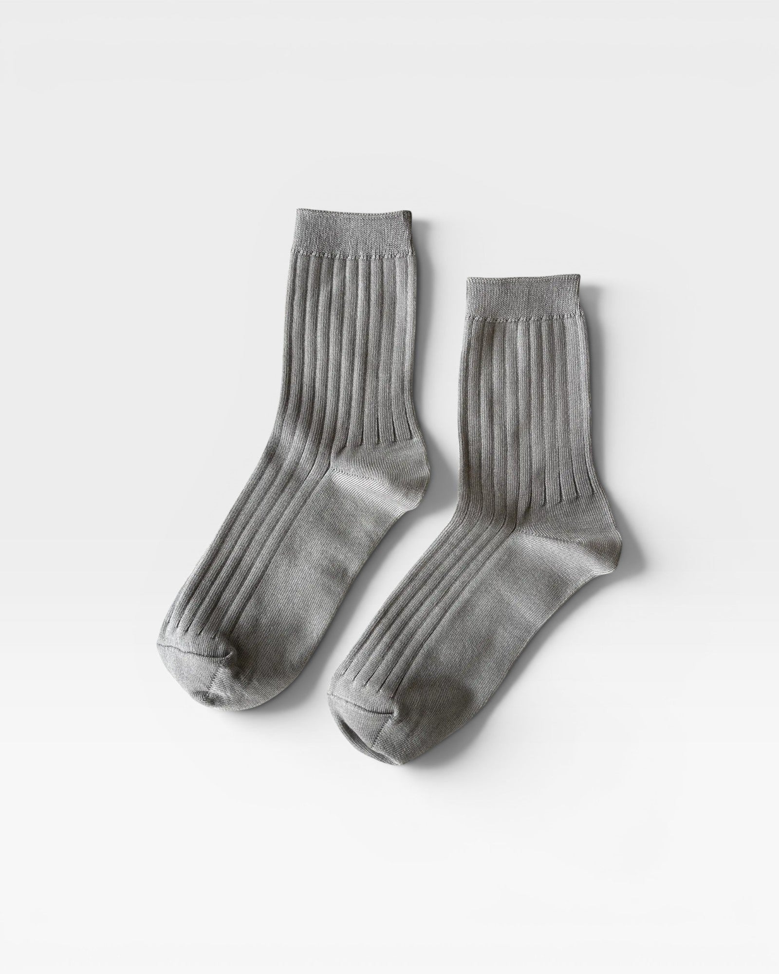 Her Socks in Stone