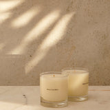 Maison Louis Marie No.03 L'Etang Noir Candle — lit candle mood shot
