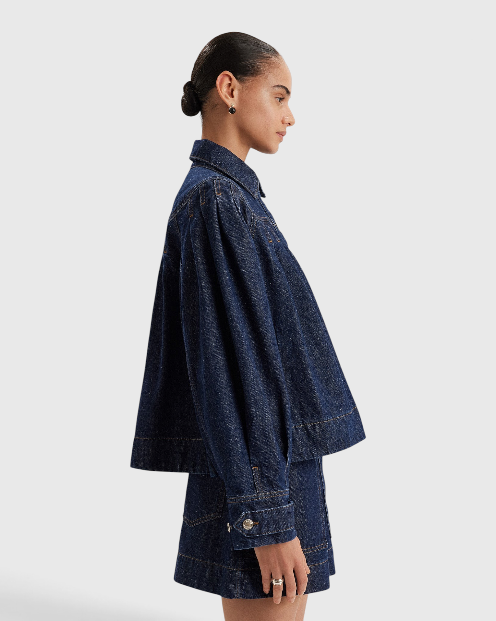 Merlette Easton Jacket in Dark Wash - side view showing the sleeve and cuff