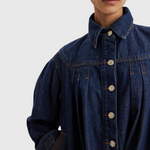 Merlette Easton Jacket in Dark Wash - close detail of the point collar, custom hardware and contrast stitching