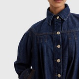 Merlette Easton Jacket in Dark Wash - close detail of the point collar, custom hardware and contrast stitching