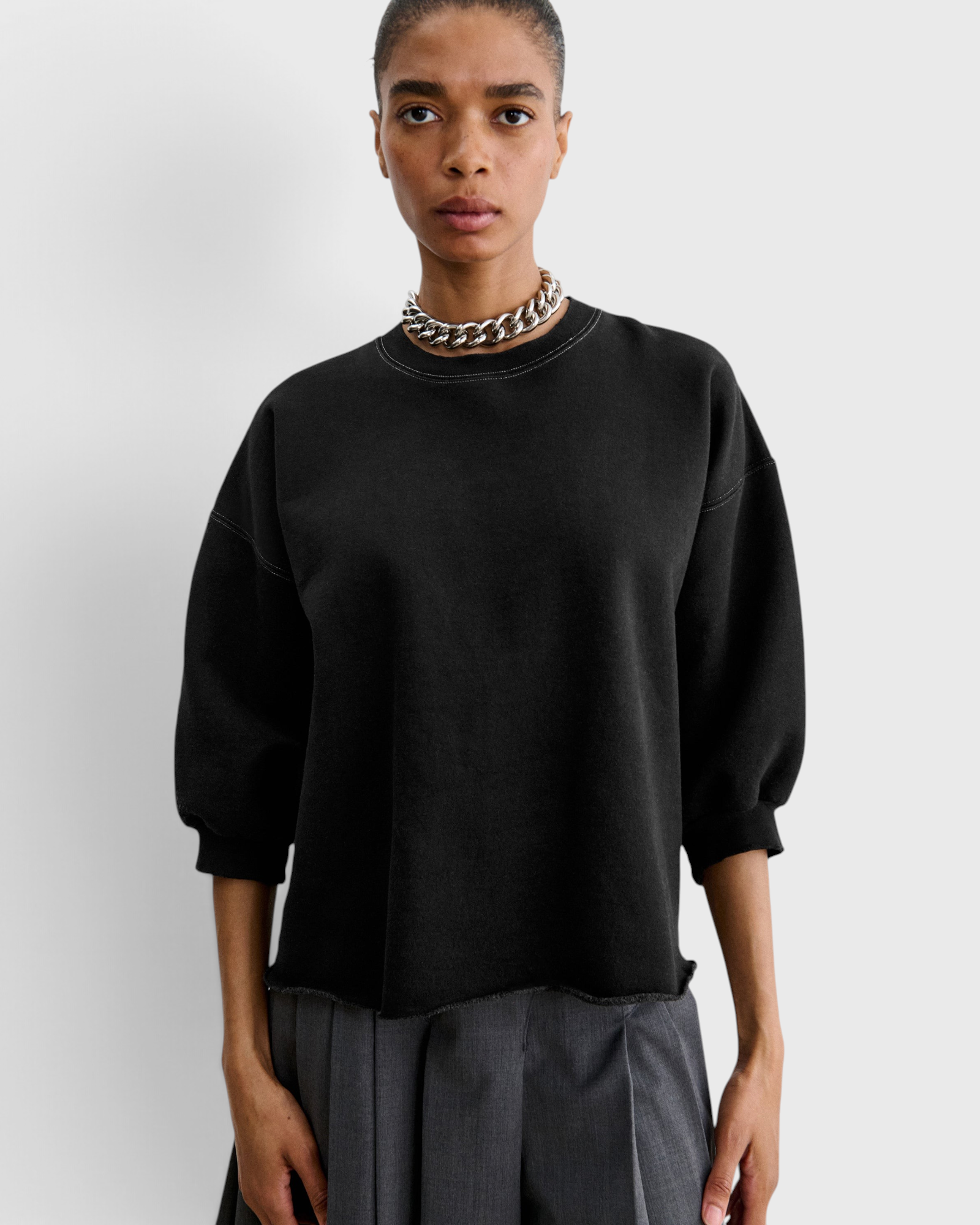 JONES + CO Rachel Comey Fond Sweatshirt in charcoal, front view with drop shoulders, cropped sleeves and raw edge hem