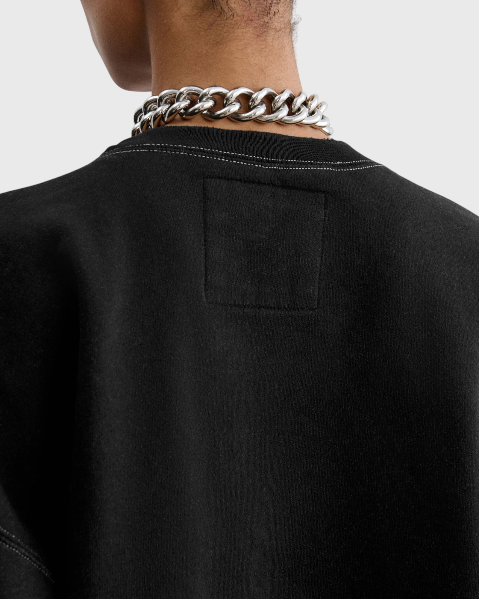 JONES + CO Rachel Comey Fond Sweatshirt in charcoal, back neck detail with label patch