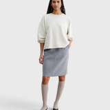 JONES + CO Rachel Comey Fond Sweatshirt in dirty white, full-length front view styled with a grey skirt