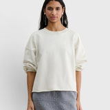 JONES + CO Rachel Comey Fond Sweatshirt in dirty white, front view with drop shoulders and raw edge hem