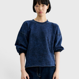 JONES + CO Rachel Comey Fond sweatshirt in acid wash indigo, close-up front view with dropped shoulders.