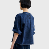 JONES + CO Rachel Comey Fond sweatshirt in acid wash indigo, back view showing raw-edge hem and label patch.