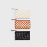 JONES + CO Odin card cases in white, tan, and black woven leather with zip closures and minimalist slim design.