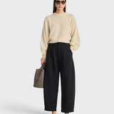 Apiece Apart Bari Crop Trouser in black, front view on model