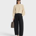 Apiece Apart Bari Crop Trouser in black, side view on model