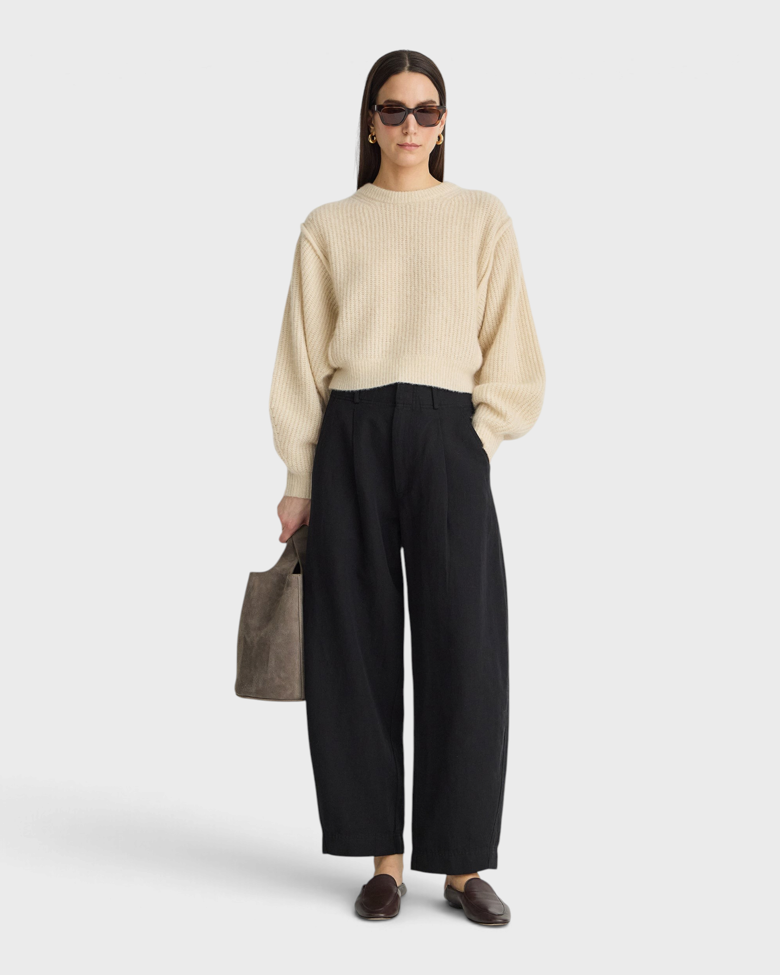 Apiece Apart Bari Crop Trouser in black, side view on model