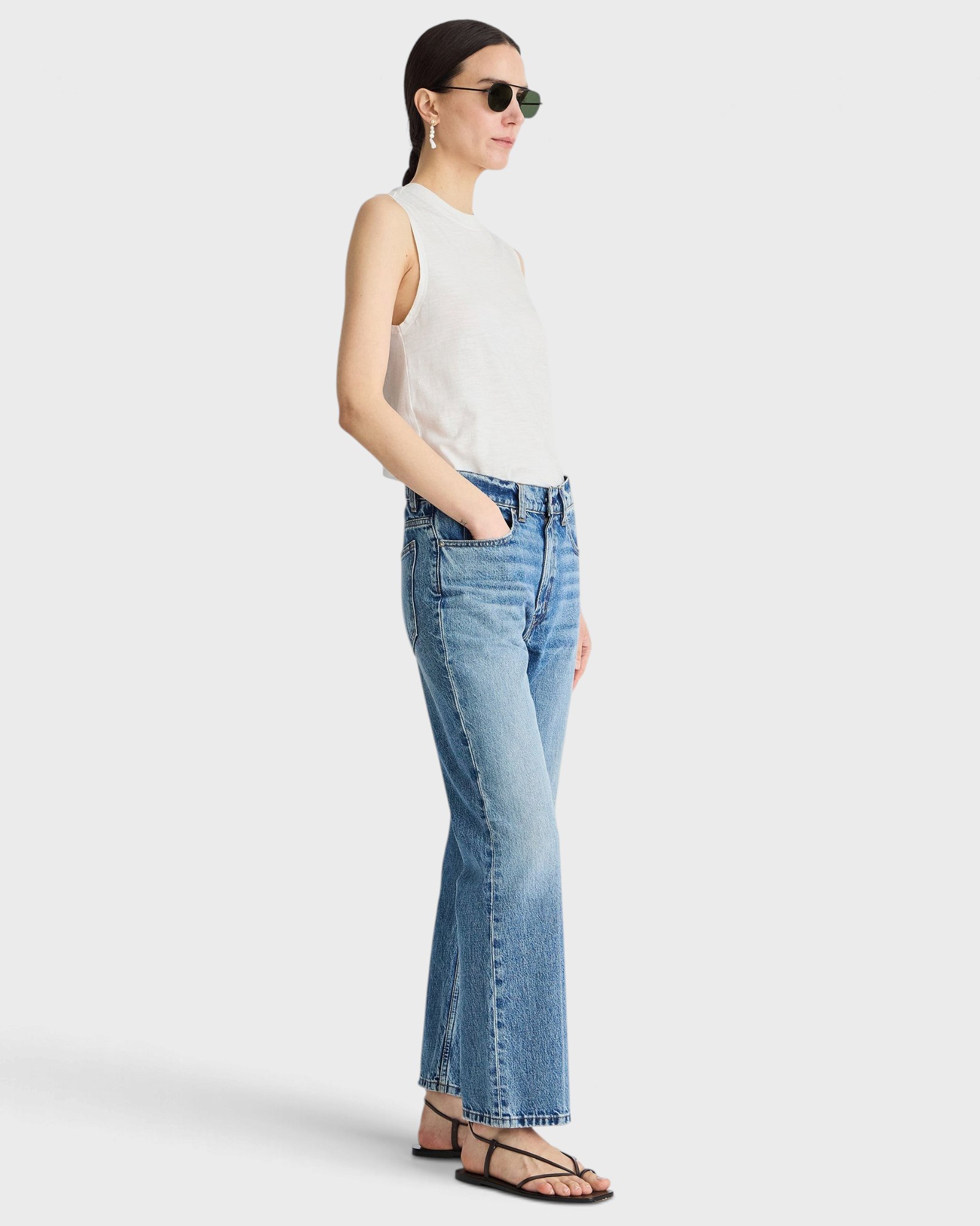 Apiece Apart Rene Kick Flare Jean in Hermosa wash, side view on model
