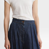 JONES + CO Coxsone dark indigo denim trousers, detail of high waist, front pleats and faux button fly.
