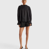 Merlette Majorelle Top in Black - full-length front view of the smocked pima cotton lawn blouse