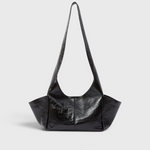 RACHEL COMEY Tool Bag in black lustre cow leather, front view with fixed shoulder strap.