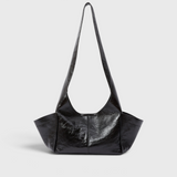 RACHEL COMEY Tool Bag in black lustre cow leather, front view with fixed shoulder strap.
