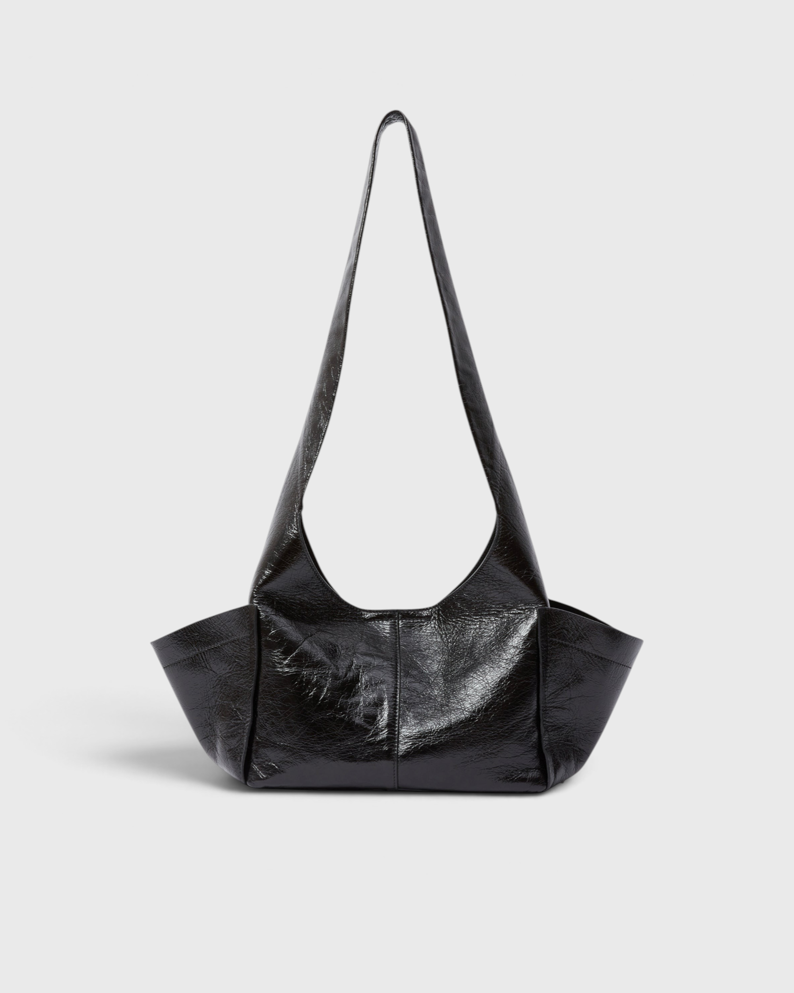 RACHEL COMEY Tool Bag in black lustre cow leather, front view with fixed shoulder strap.