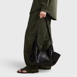 RACHEL COMEY Tool Bag in black leather, back view.