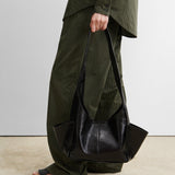 RACHEL COMEY Tool Bag in black leather, back view.