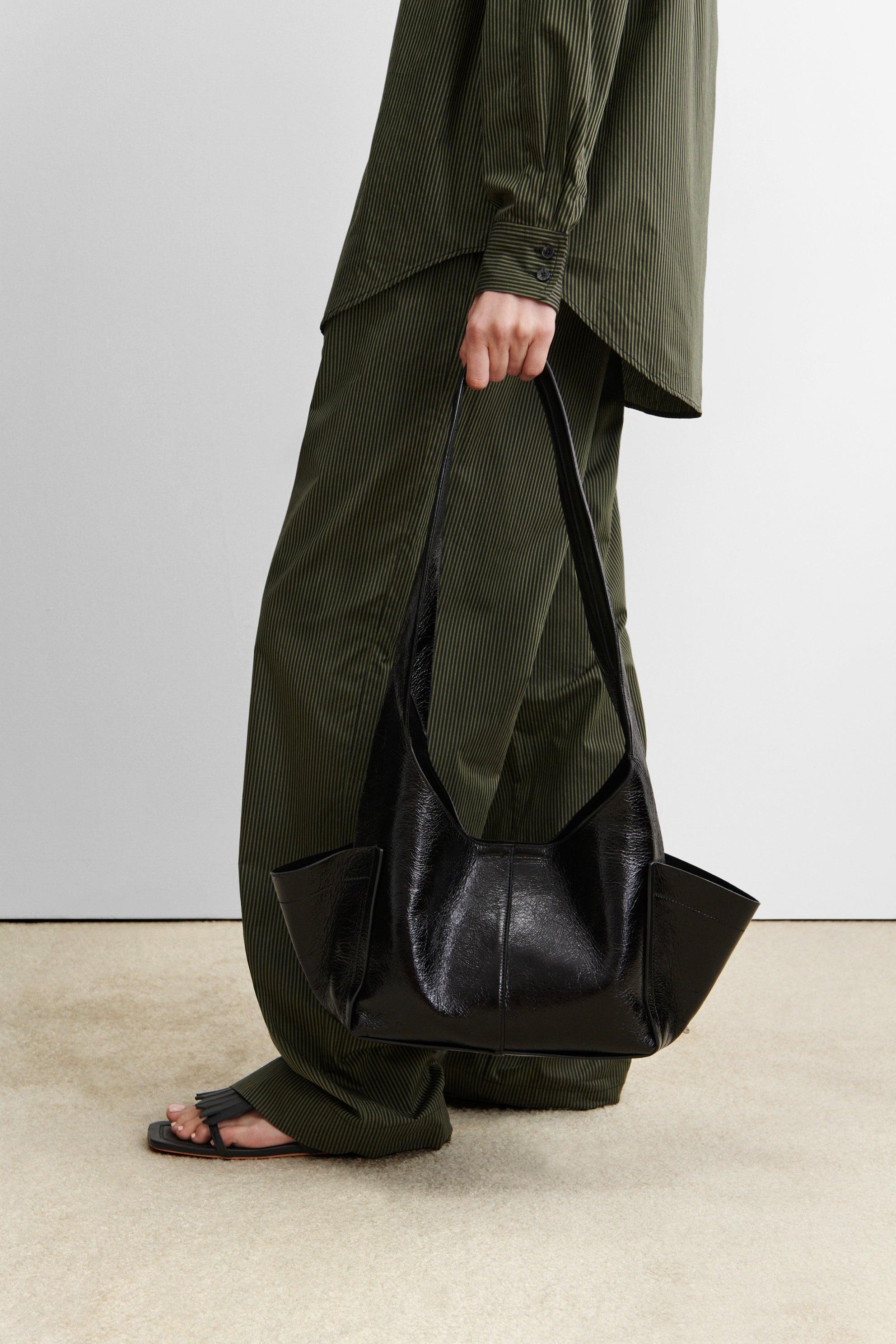 RACHEL COMEY Tool Bag in black leather, back view.