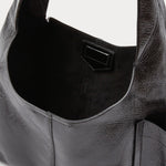 RACHEL COMEY Tool Bag in black leather, detail of strap and stitching.