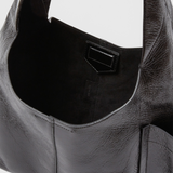 RACHEL COMEY Tool Bag in black leather, detail of strap and stitching.