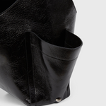 RACHEL COMEY Tool Bag in black leather, detail of crinkled lustre finish.
