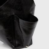 RACHEL COMEY Tool Bag in black leather, detail of crinkled lustre finish.