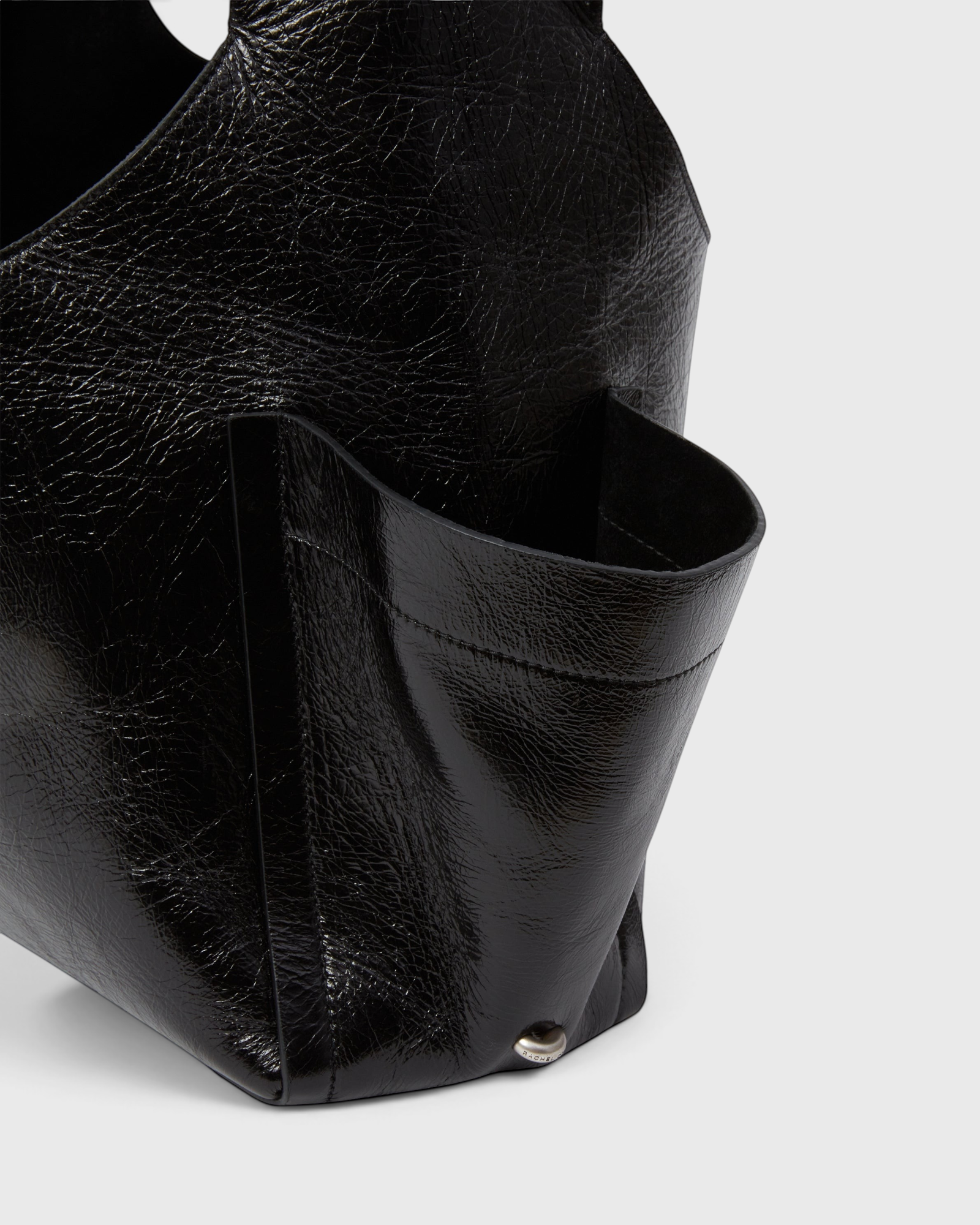 RACHEL COMEY Tool Bag in black leather, detail of crinkled lustre finish.