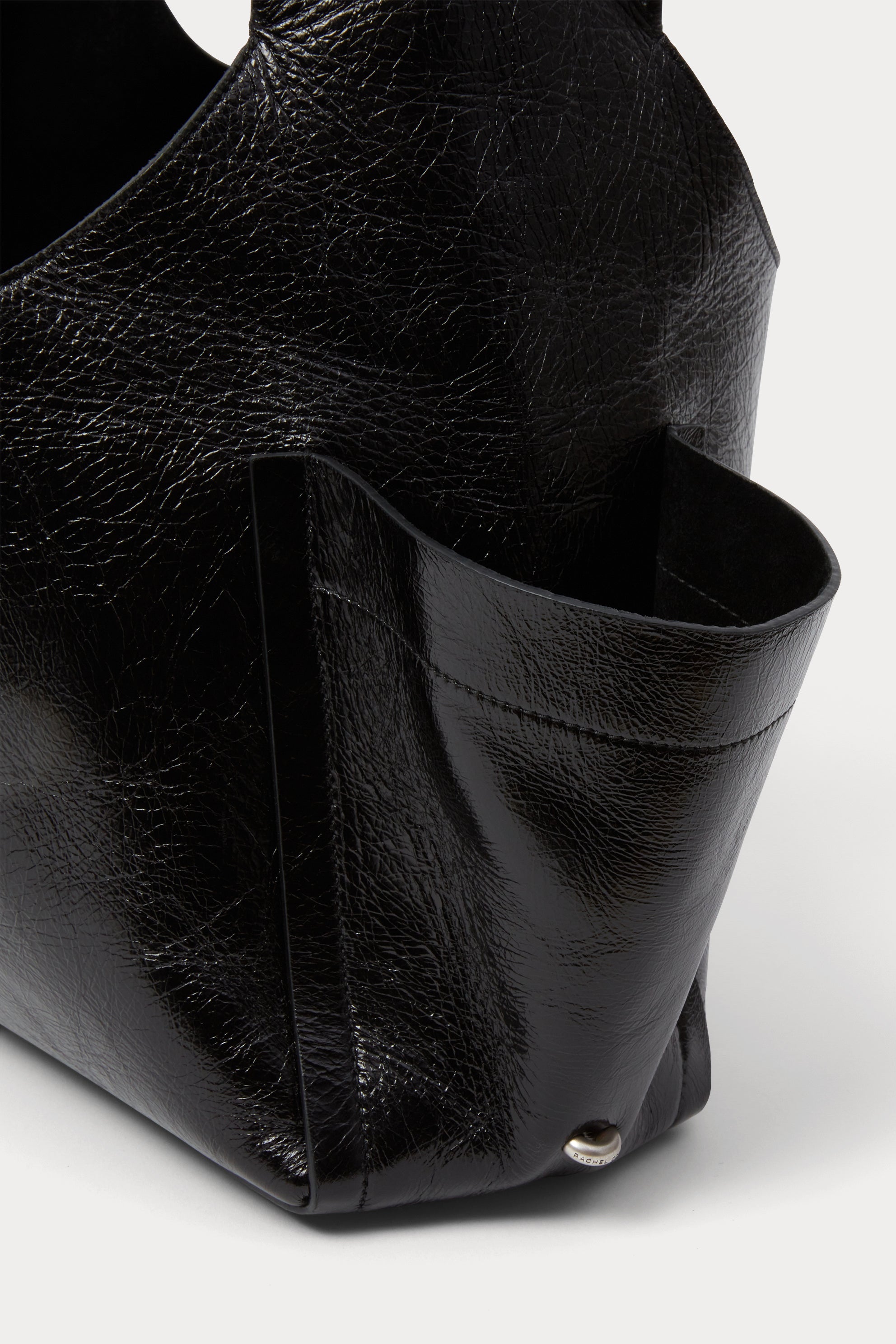 RACHEL COMEY Tool Bag in black leather, detail of crinkled lustre finish.
