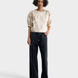JONES + CO Rachel Comey Filly Top in champagne shimmery textured silk with boat neckline and sculptural puff sleeves.