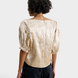 JONES + CO Rachel Comey Filly Top in champagne shimmery silk with elasticated cuffs and rear zip closure.