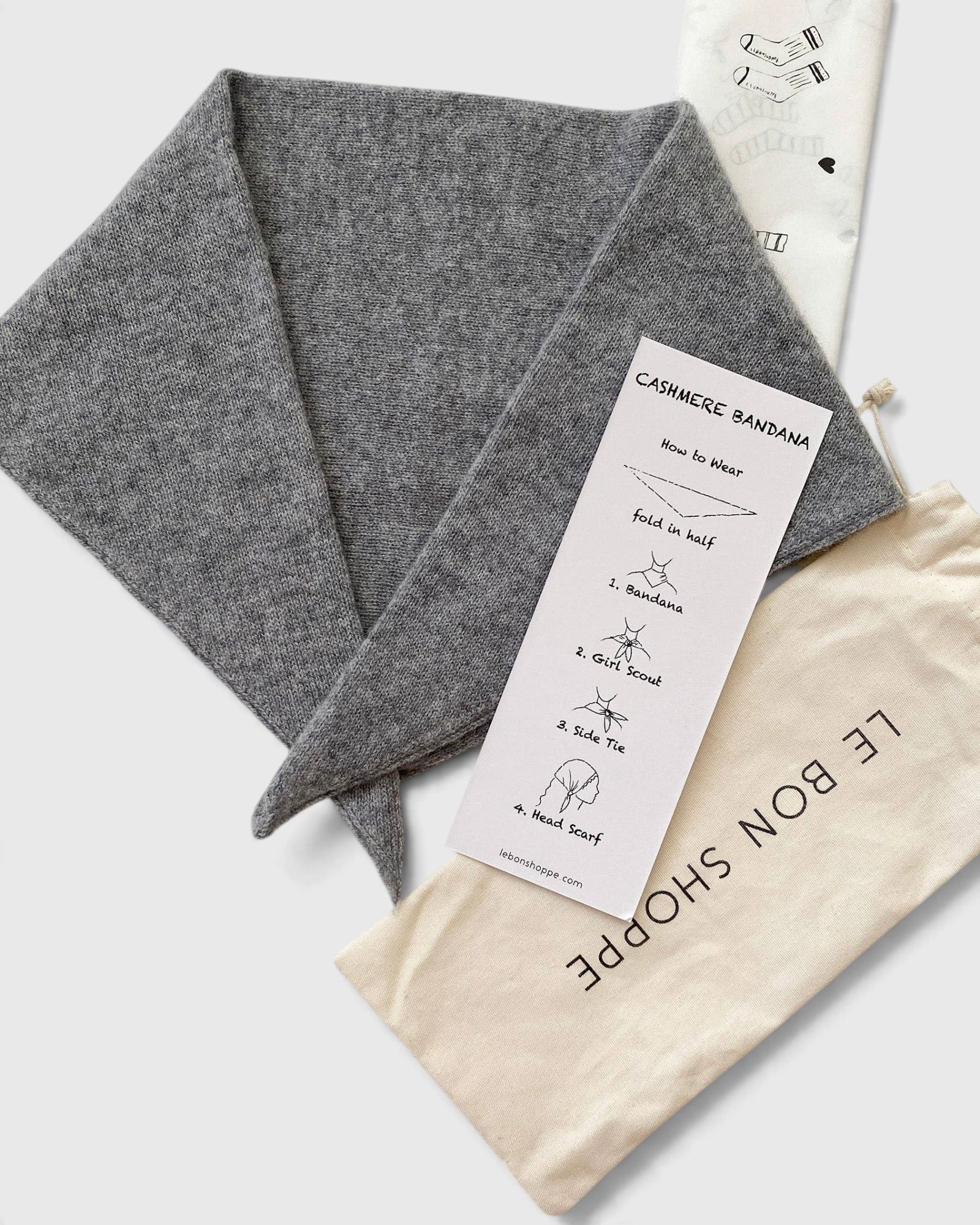 JONES + CO grey cashmere and wool blend bandana scarf with instructional card and cotton storage pouch