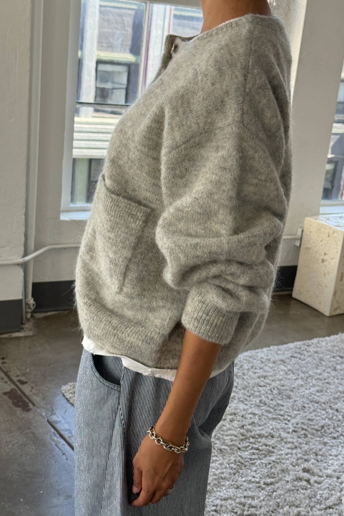 Amélie Alpaca Cardigan - Light Grey side view sleeve rolled up 