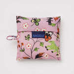 Baggu Standard Baggu in Castle Creatures, folded into its pouch