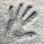hand print in the flakey Norwegian sea salt