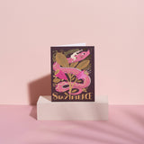 Greeting card with pink dragon design and 'Stay Fierce' text on a pink background